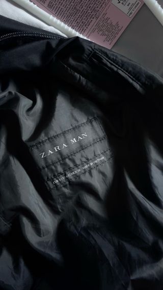 Chaqueta bomber negra y gris