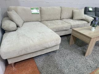 Sofá modular beige con cojines