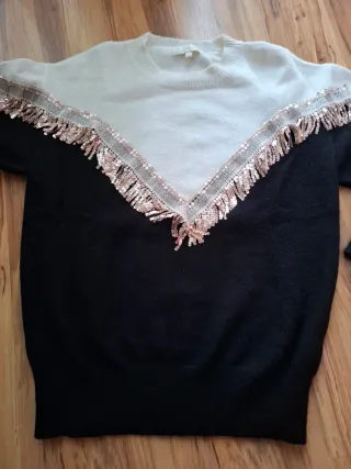 Jersey mujer negro y blanco con flecos