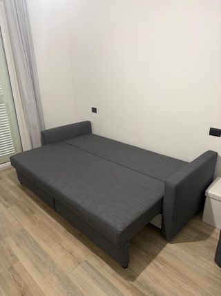 Divano letto in tessuto grigio