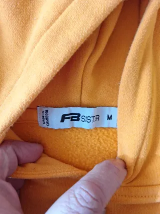 Sudadera naranja con texto Good Things