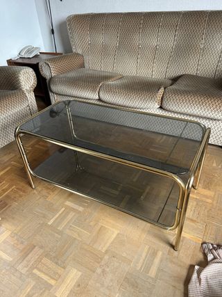 Mesa de centro vintage de cristal y metal dorado