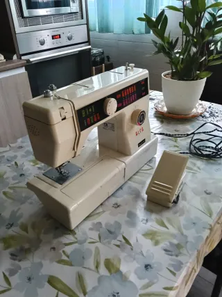 Maquina de coser alfa
