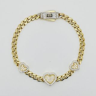 PULSERA BARBADA 3 CORAZONES Y CIRCONITAS. Oro 18k.