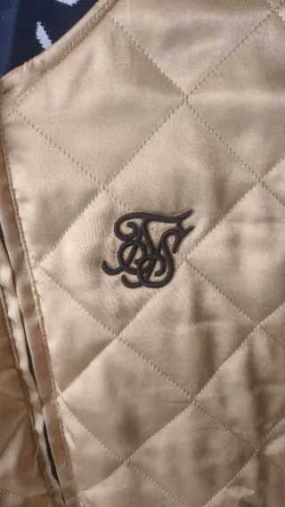 Cazadora SikSilk dorada acolchada