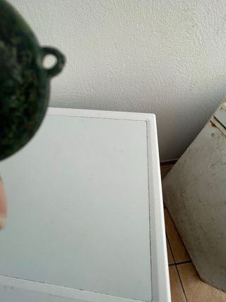 Medallón antiguo con pátina verde