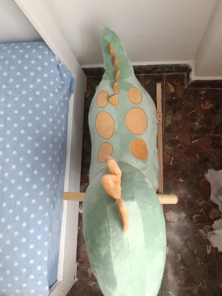 Dinosaurio balancín peluche