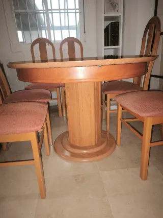 Mesa comedor redonda extensible y 6 sillas