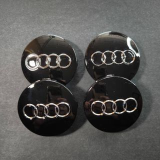 TAPABUJES AUDI 60mm NEGRO - EMBLEMA LLANTAS AUDI
