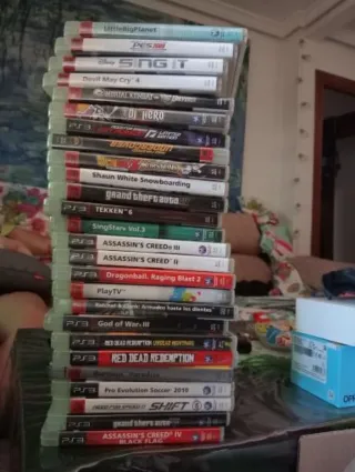 PS3 + mando + 16 Juegos  Micrófonos, mando play TV