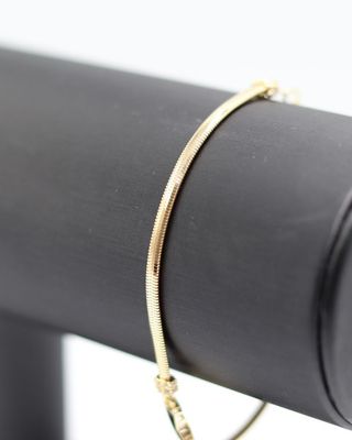 PULSERA SERPIENTE MARIPOSA CON CIRCONITAS. Oro18K.