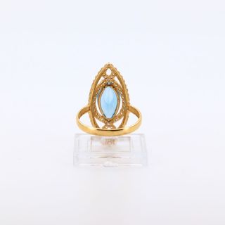 LANZADERA CIRCONITAS AZUL. Oro 18k.