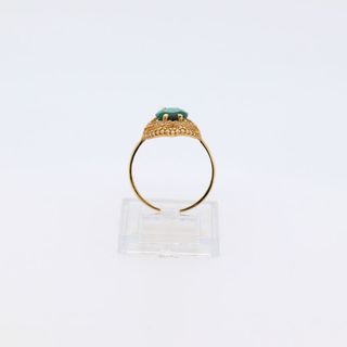 LANZADERA CIRCONITAS VERDE. Oro 18k.