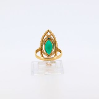 LANZADERA CIRCONITAS VERDE. Oro 18k.