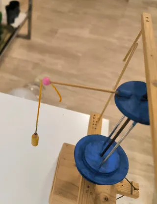 Juguete de movimiento de madera