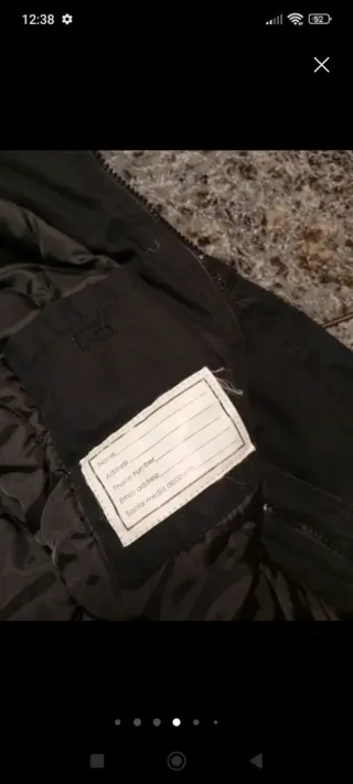 Parka negra talla M con capucha