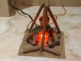 Hoguera eléctrica con caldero