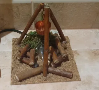 Hoguera eléctrica con caldero