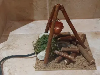 Hoguera eléctrica con caldero