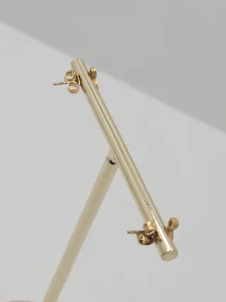 Pendientes clave de sol dorados