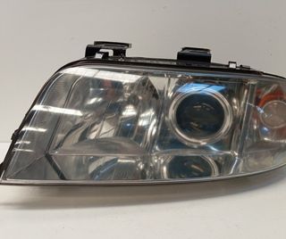 Faro izq audi a6 avant (4b5) 2.4 v6 30v cat 379057