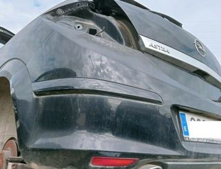 Paragolpes trasero opel astra gtc cosmo 303233