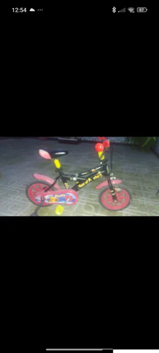 Bicicleta infantil rosa y negra