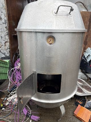 Asador de patos al carbón