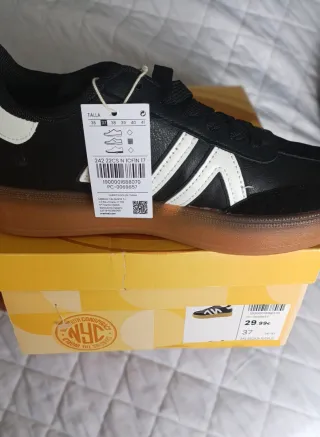 Zapatillas deportivas chica negras y blancas