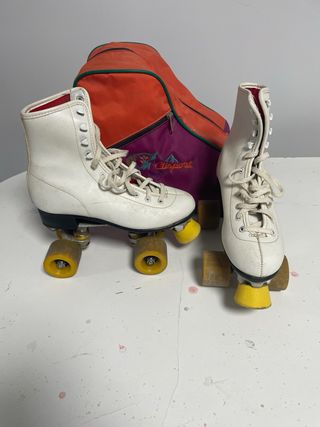 Patines blancos 4 ruedas + bolsa