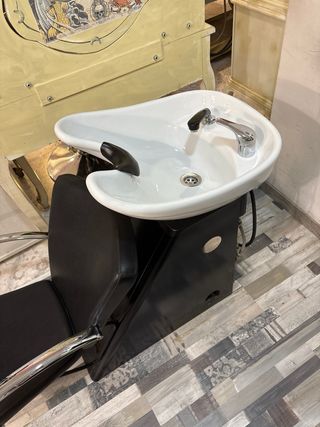 Lavabo de peluquería con silla