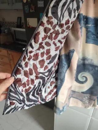 por la compra de la camisa regalo el  chaleco T48