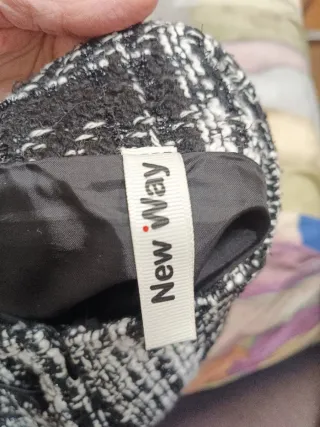 Minigonna tartan nero bianco con inserti in ecopel