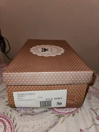 Sandalias azules y doradas para mujer