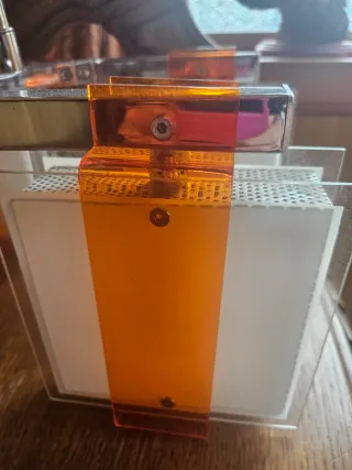 Lámpara de cristal naranja y metal