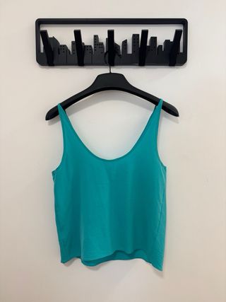 Blusa sin mangas azul turquesa