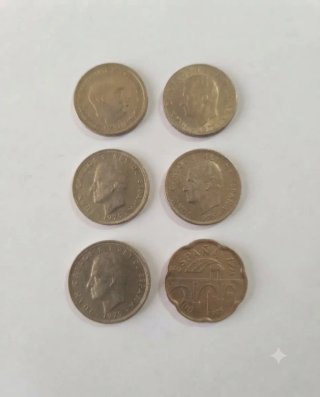 6 x 10 euros. Monedas de 5 y 50 Pesetas.