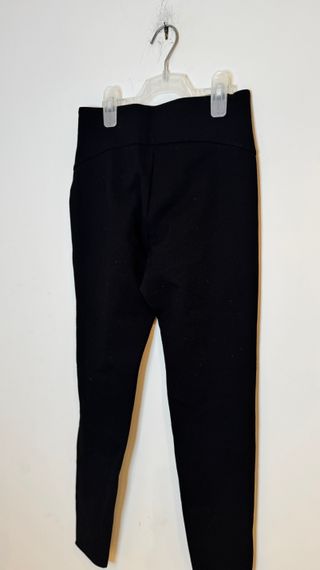 Pantalones negros con cremallera