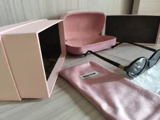 Miu Miu SMU04Z Occhiali da Sole Neri