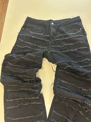 Jeans baggy neri strappati