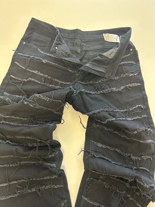 Jeans baggy neri strappati