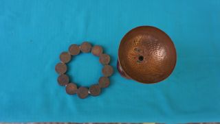 Cenicero monedas bola mundo mapa leer ver fotos