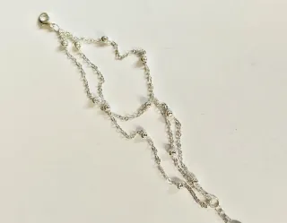 Pulsera triple cadena con bolitas