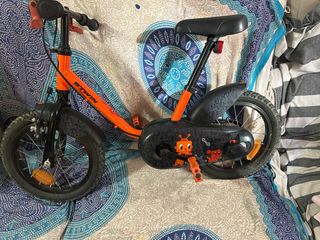Bicicleta infantil Btwin naranja negociable