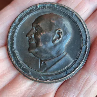 Medaglia antica con profilo giulio luigi mascarelo