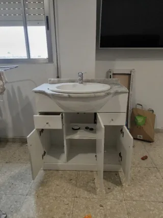 Mueble de baño con lavabo de mármol