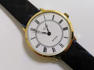 Reloj Silvana Ultra Slim Railroad Dorado