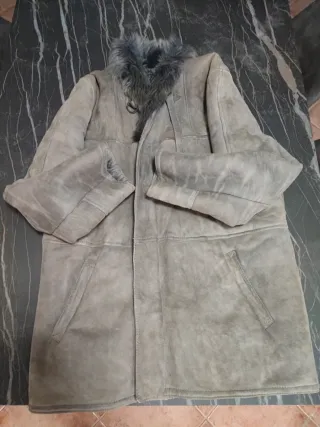 Montone uomo tg. 56 grigio