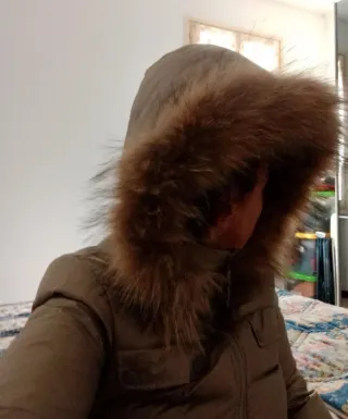 Piumino Sisley donna verde oliva con cappuccio