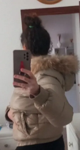 Piumino Sisley donna verde oliva con cappuccio